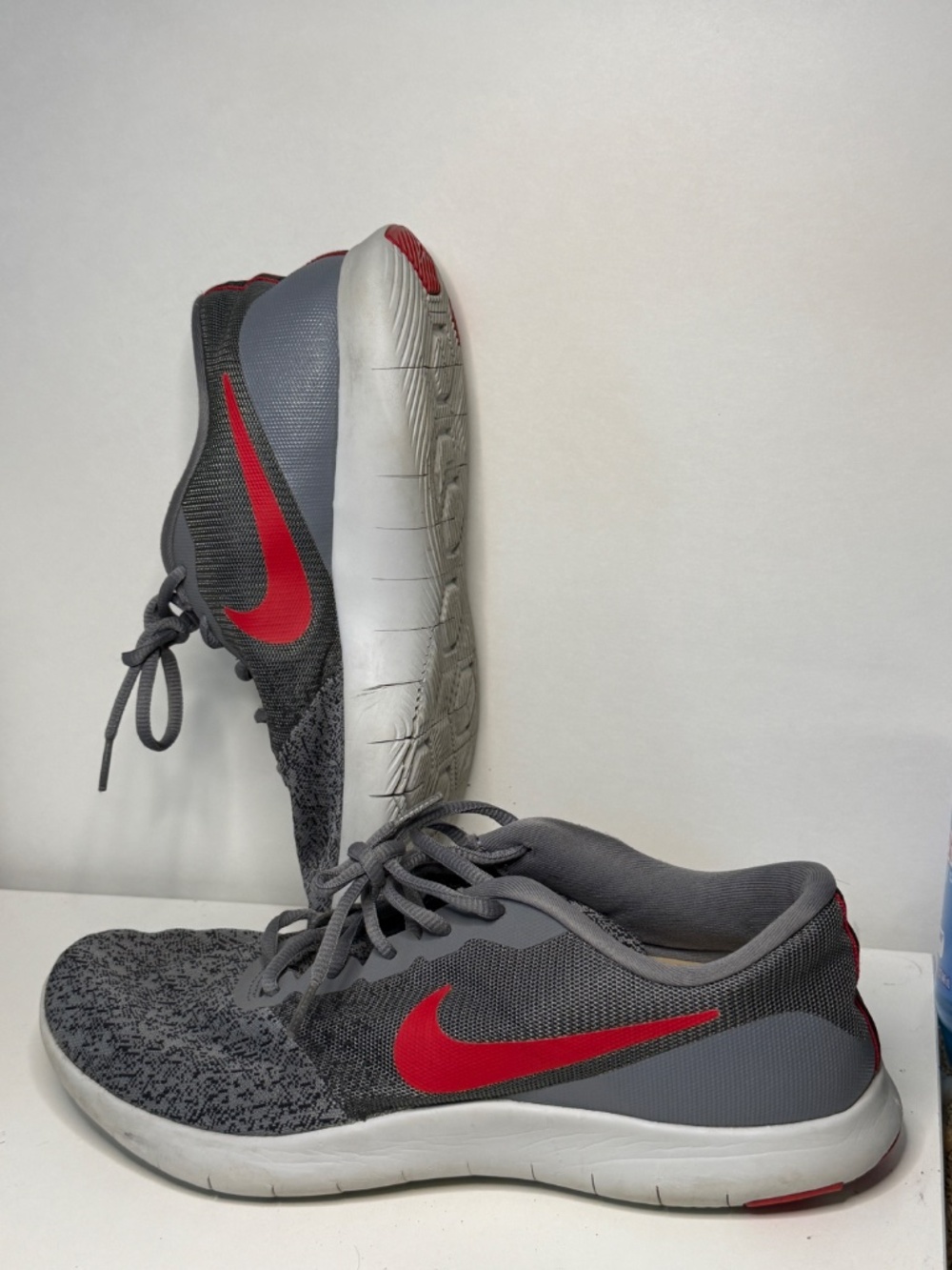 Nike Flex Contact sneakers in the Cool Grey / University Red Men’s 10.5